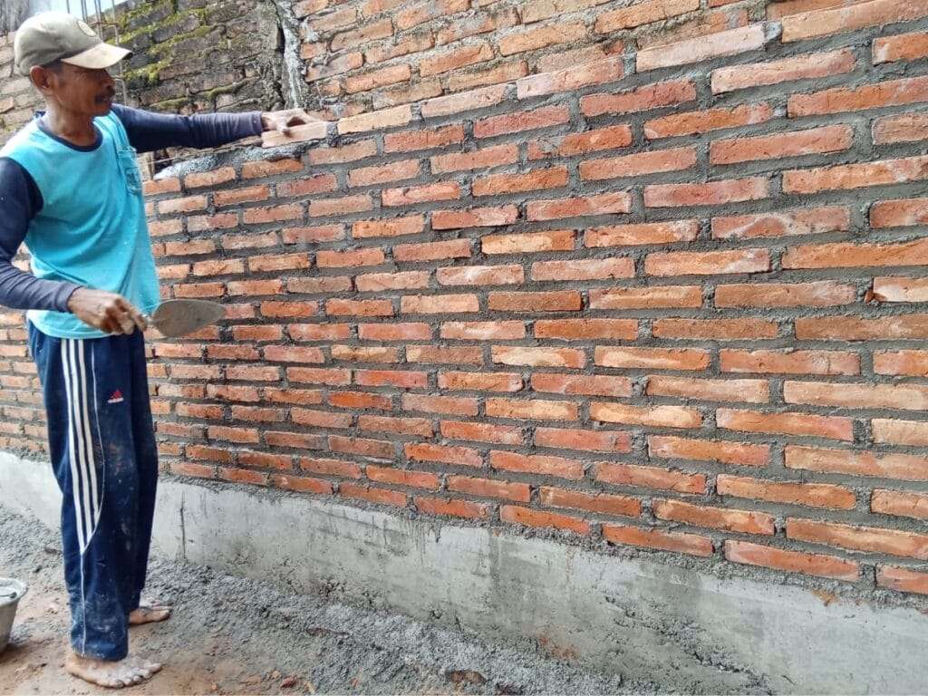 Como levantar paredes de tijolos passo a passo